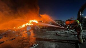 Israel Industrial Site Fire After Iranian Attack Amid Lebanon Journalist Mourning